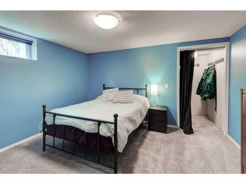 171 Riverbrook Way Se, Calgary, AB - Indoor Photo Showing Bedroom