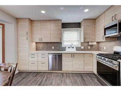 171 Riverbrook Way Se, Calgary, AB - Indoor Photo Showing Kitchen With Upgraded Kitchen