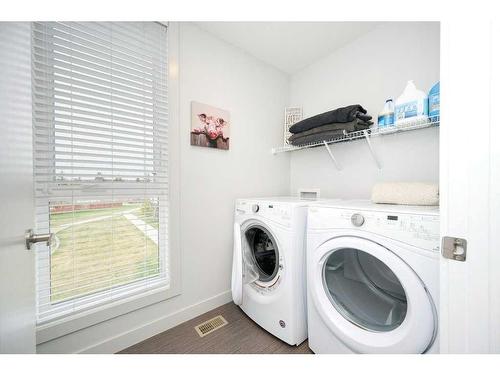 303 Bow Grove Nw, Calgary, AB - Indoor Photo Showing Laundry Room