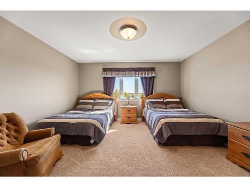 33550 Range Road 23, Rural Mountain View County, AB - Indoor Photo Showing Bedroom