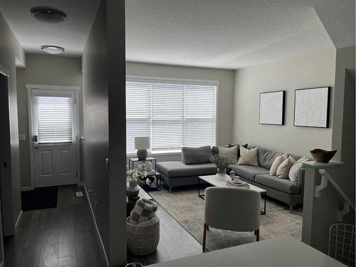 135 Masters Square Se, Calgary, AB - Indoor Photo Showing Living Room