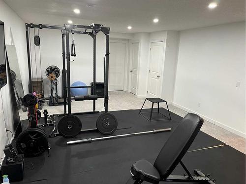 135 Masters Square Se, Calgary, AB - Indoor Photo Showing Gym Room