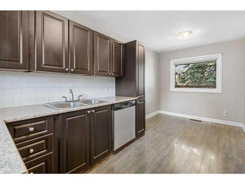 2432 36 Street Se, Calgary, AB - Indoor Photo Showing Kitchen With Double Sink