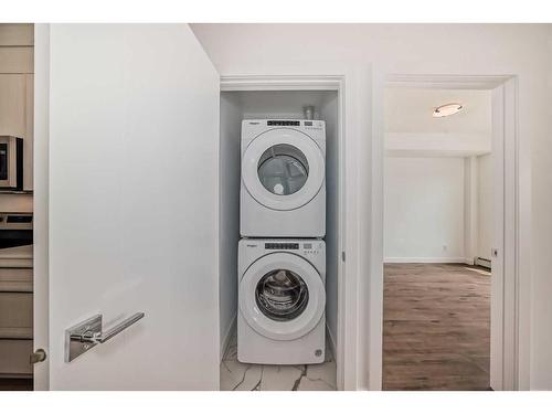 1411-681 Savanna Boulevard Ne, Calgary, AB - Indoor Photo Showing Laundry Room