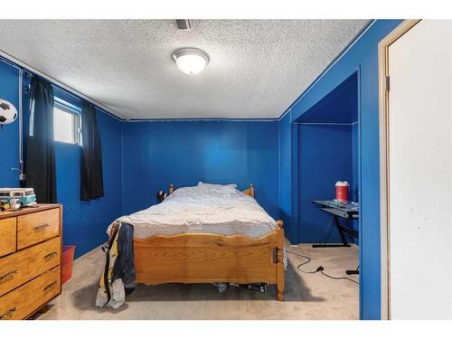244 200 Spring Haven Court Se, Airdrie, AB - Indoor Photo Showing Bedroom