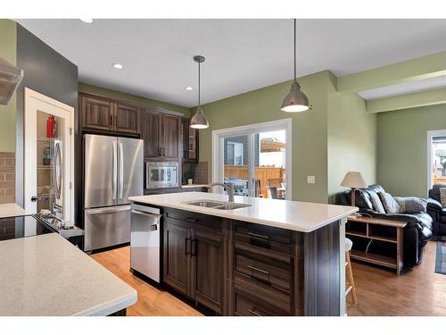 12 Legacy Bay Se, Calgary, AB - Indoor Photo Showing Kitchen With Stainless Steel Kitchen With Double Sink