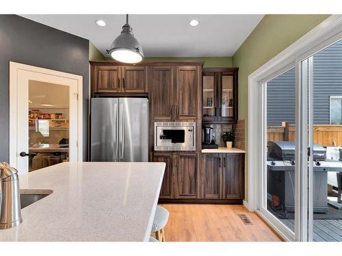 12 Legacy Bay Se, Calgary, AB - Indoor Photo Showing Kitchen With Stainless Steel Kitchen With Upgraded Kitchen