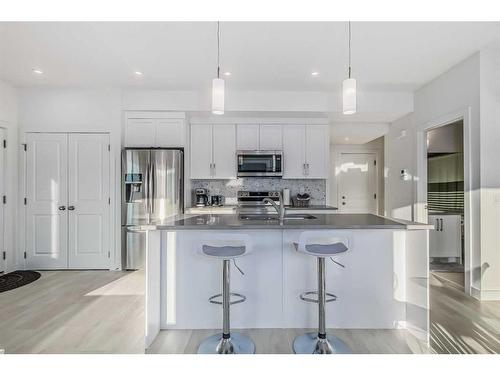 272 Canals Crossing Sw, Airdrie, AB - Indoor Photo Showing Kitchen With Stainless Steel Kitchen With Upgraded Kitchen