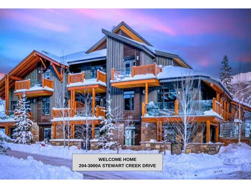 204-3000A Stewart Creek Drive, Canmore, AB - Outdoor With Facade