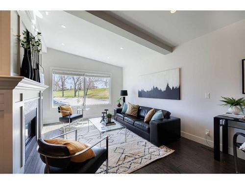 2416 58 Avenue Sw, Calgary, AB - Indoor Photo Showing Living Room With Fireplace