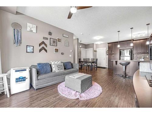 5208-522 Cranford Drive Se, Calgary, AB - Indoor Photo Showing Living Room