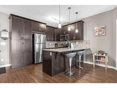 5208-522 Cranford Drive Se, Calgary, AB - Indoor Photo Showing Kitchen With Stainless Steel Kitchen With Upgraded Kitchen