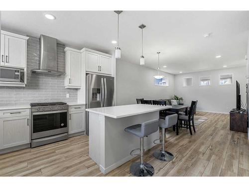 310 Midgrove Link Sw, Airdrie, AB - Indoor Photo Showing Kitchen With Stainless Steel Kitchen With Upgraded Kitchen