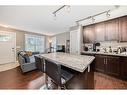 162 Cranford Walk Se, Calgary, AB  - Indoor Photo Showing Kitchen With Double Sink 