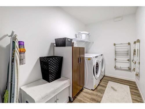 11 Arbour Lake Heights Nw, Calgary, AB - Indoor Photo Showing Laundry Room