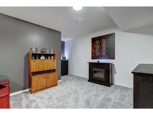 11 Arbour Lake Heights Nw, Calgary, AB - Indoor With Fireplace