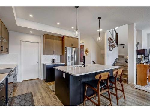 11 Arbour Lake Heights Nw, Calgary, AB - Indoor Photo Showing Kitchen With Upgraded Kitchen