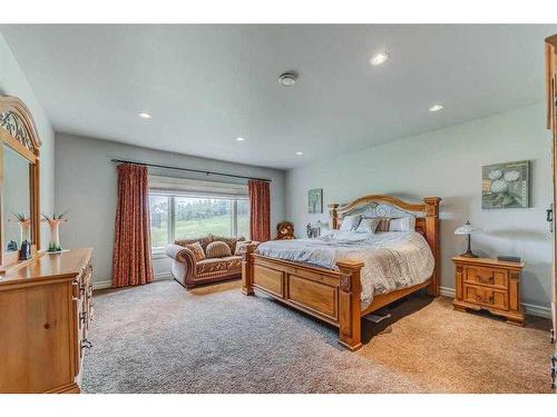 234097 48 Street West, Rural Foothills County, AB - Indoor Photo Showing Bedroom