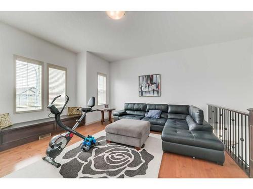 144 Cranford Drive Se, Calgary, AB - Indoor Photo Showing Living Room
