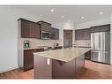 144 Cranford Drive Se, Calgary, AB  - Indoor Photo Showing Kitchen With Upgraded Kitchen 