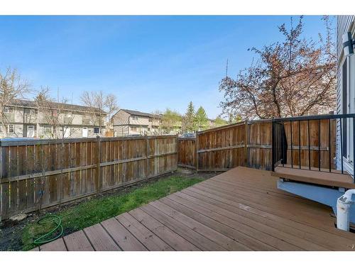 404-330 Falconridge Crescent Ne, Calgary, AB - Outdoor With Deck Patio Veranda