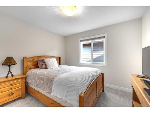 91 Cranbrook Crescent Se, Calgary, AB - Indoor Photo Showing Bedroom