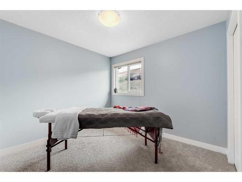 91 Cranbrook Crescent Se, Calgary, AB - Indoor Photo Showing Bedroom