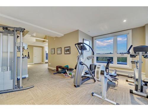 1801-400 Eau Claire Avenue Sw, Calgary, AB - Indoor With Fireplace