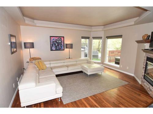 10 Mt Gibraltar Heights Se, Calgary, AB - Indoor Photo Showing Living Room With Fireplace