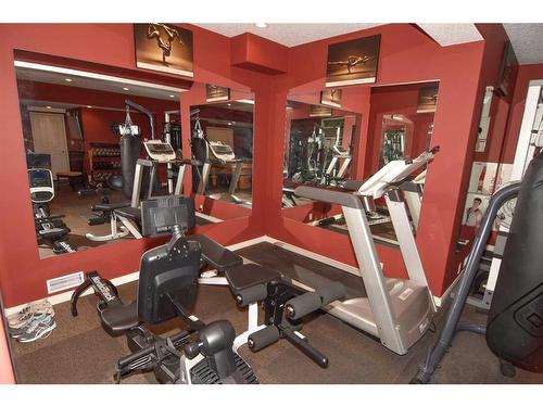 10 Mt Gibraltar Heights Se, Calgary, AB - Indoor Photo Showing Gym Room