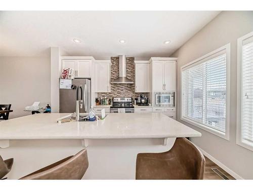 24 Howse Drive Nw, Calgary, AB - Indoor Photo Showing Kitchen With Stainless Steel Kitchen With Upgraded Kitchen