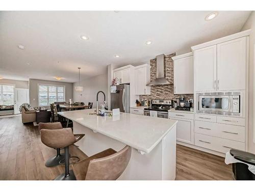 24 Howse Drive Nw, Calgary, AB - Indoor Photo Showing Kitchen With Upgraded Kitchen
