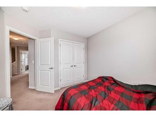 24 Howse Drive Nw, Calgary, AB - Indoor Photo Showing Bedroom
