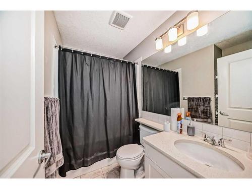 24 Howse Drive Nw, Calgary, AB - Indoor Photo Showing Bathroom