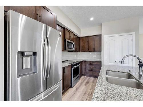 427 Cornerstone Avenue Ne, Calgary, AB - Indoor Photo Showing Kitchen With Double Sink With Upgraded Kitchen