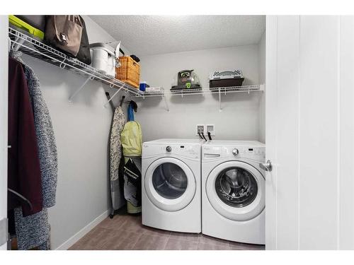 110-6603 New Brighton Avenue Se, Calgary, AB - Indoor Photo Showing Laundry Room