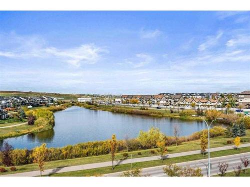 110-6603 New Brighton Avenue Se, Calgary, AB - Outdoor With Body Of Water With View