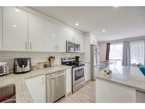 19 Bermondsey Place Nw, Calgary, AB - Indoor Photo Showing Kitchen With Stainless Steel Kitchen With Upgraded Kitchen