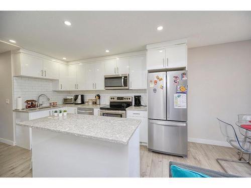 19 Bermondsey Place Nw, Calgary, AB - Indoor Photo Showing Kitchen With Stainless Steel Kitchen With Upgraded Kitchen