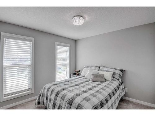 35 Walcrest View Se, Calgary, AB - Indoor Photo Showing Bedroom