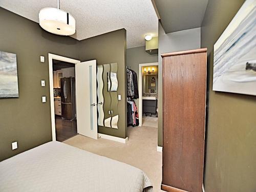 107-1408 17 Street Se, Calgary, AB - Indoor Photo Showing Bedroom