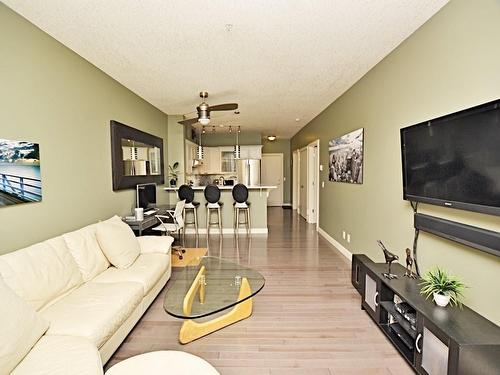 107-1408 17 Street Se, Calgary, AB - Indoor Photo Showing Living Room