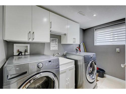11 Woodlark Drive Sw, Calgary, AB - Indoor Photo Showing Laundry Room