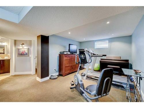 11 Woodlark Drive Sw, Calgary, AB - Indoor Photo Showing Gym Room