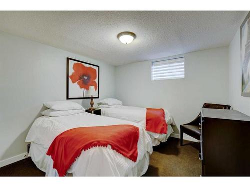 11 Woodlark Drive Sw, Calgary, AB - Indoor Photo Showing Bedroom