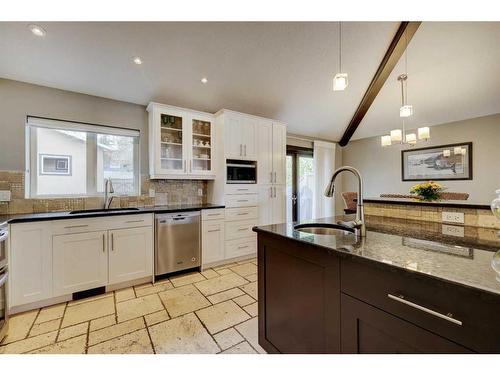 11 Woodlark Drive Sw, Calgary, AB - Indoor Photo Showing Kitchen With Upgraded Kitchen