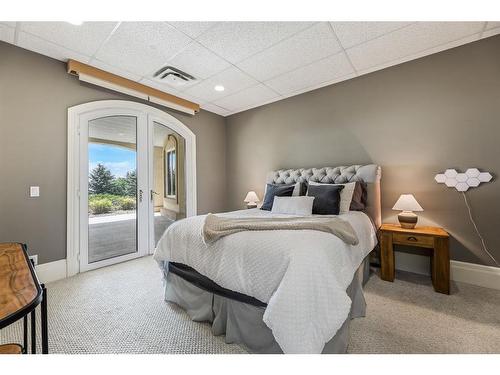 36 West Meadows Drive, Rural Rocky View County, AB - Indoor Photo Showing Bedroom