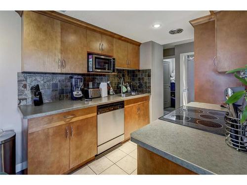 604-1309 14 Avenue Sw, Calgary, AB - Indoor Photo Showing Kitchen With Double Sink