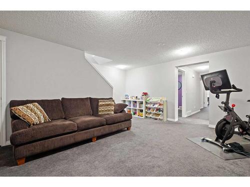 1363 New Brighton Park Se, Calgary, AB - Indoor Photo Showing Gym Room
