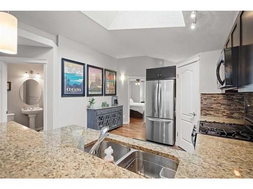 1363 New Brighton Park Se, Calgary, AB - Indoor Photo Showing Kitchen With Double Sink